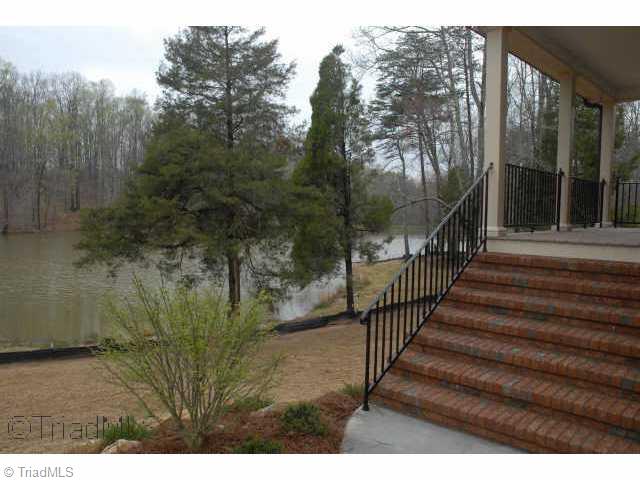 6309 Nesting Way Oak Ridge, NC 27310 - Photo 3 of 8 Other. View of lake from back porch