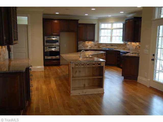 6309 Nesting Way Oak Ridge, NC 27310 - Photo 4 of 8 Other. Large gourmet kitchen with stainless appliances