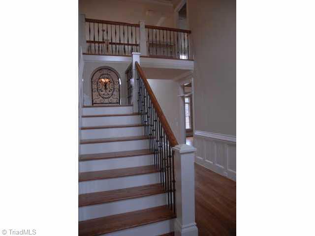 6309 Nesting Way Oak Ridge, NC 27310 - Photo 5 of 8 Other. Lovely wrought iron staircase