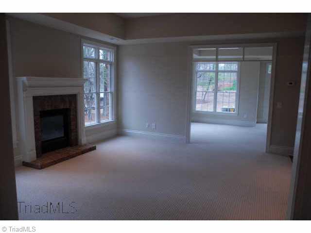 6309 Nesting Way Oak Ridge, NC 27310 - Photo 8 of 8 Other. Full finished basement w/ fireplace and kitchenette