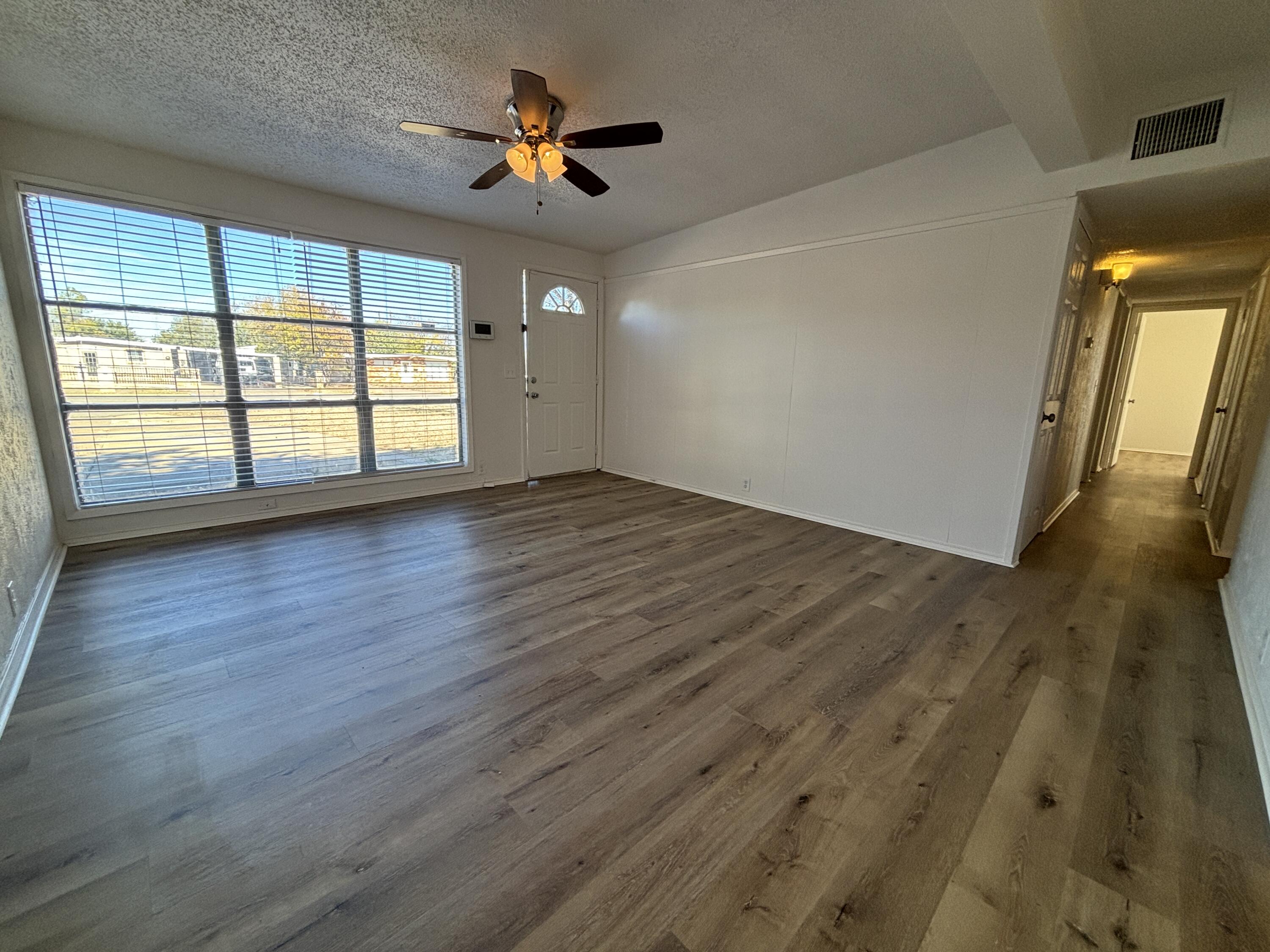 2719 66th Street Lubbock, TX 79413 - Photo 3 of 13 IMG_9549