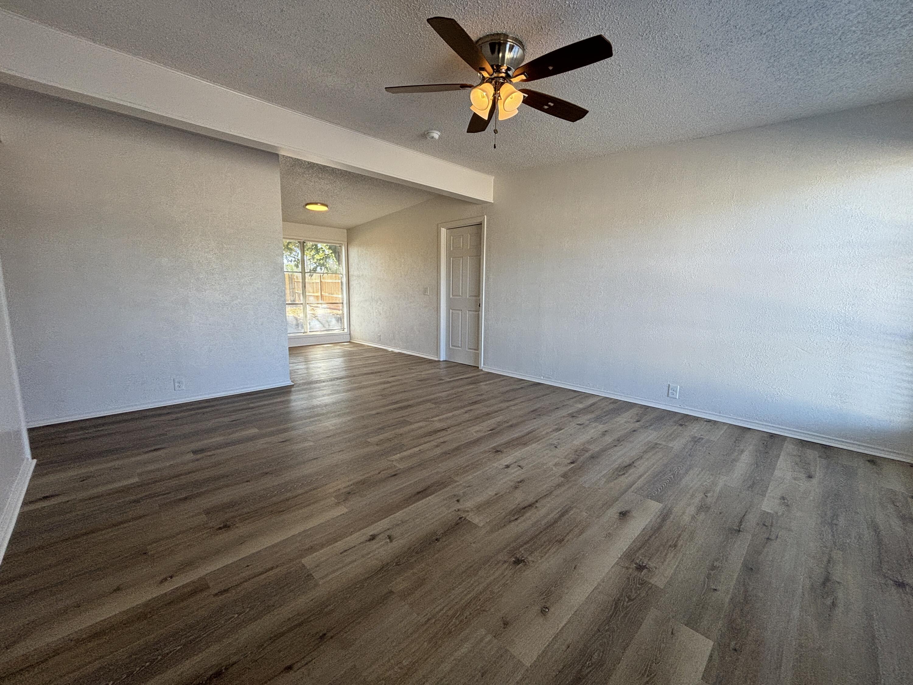 2719 66th Street Lubbock, TX 79413 - Photo 4 of 13 IMG_9548