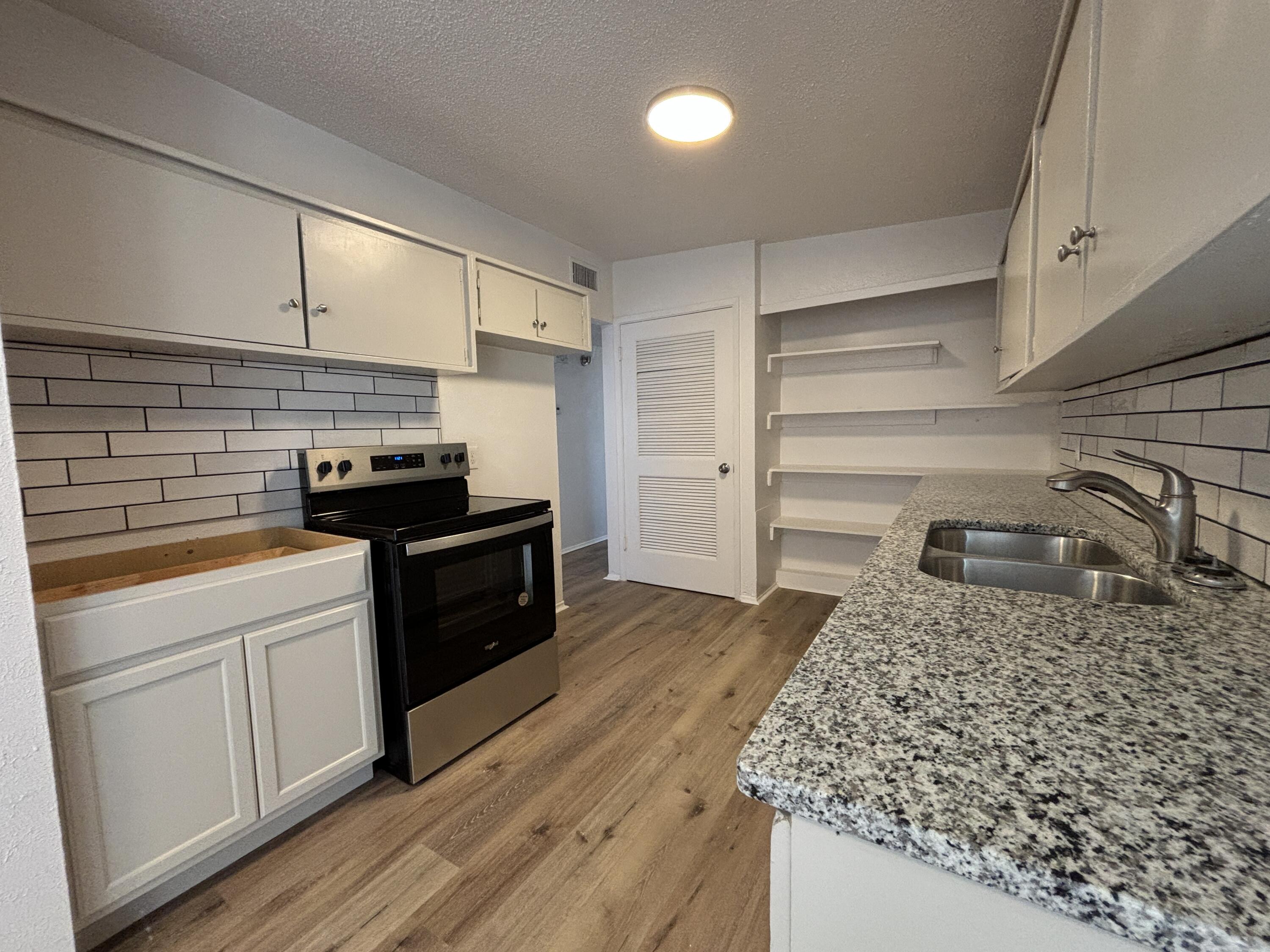 2719 66th Street Lubbock, TX 79413 - Photo 5 of 13 IMG_9617