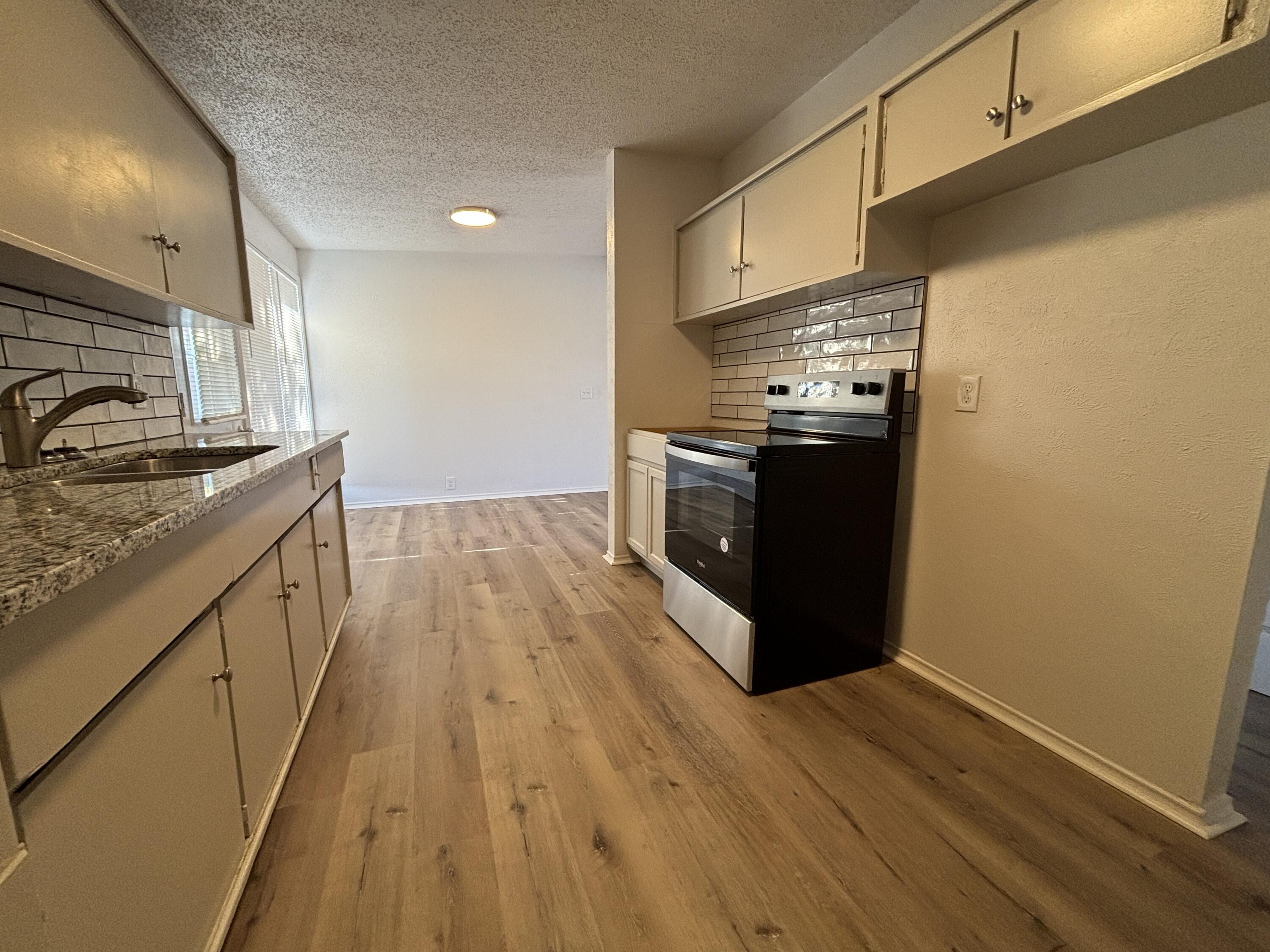 2719 66th Street Lubbock, TX 79413 - Photo 6 of 13 IMG_9618