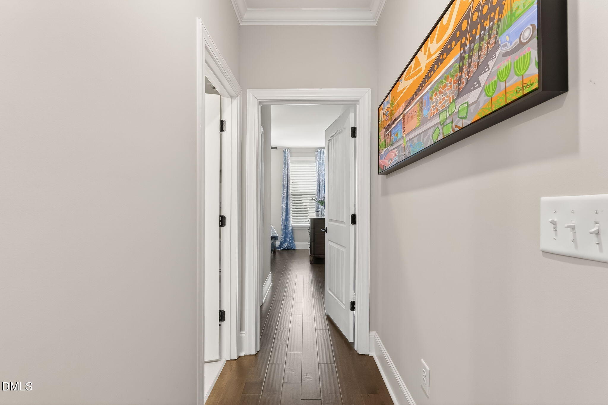 524 Dungannon Loop Clayton, NC 27520 - Photo 22 of 80 a view of a hallway with wooden floor and a bathroom