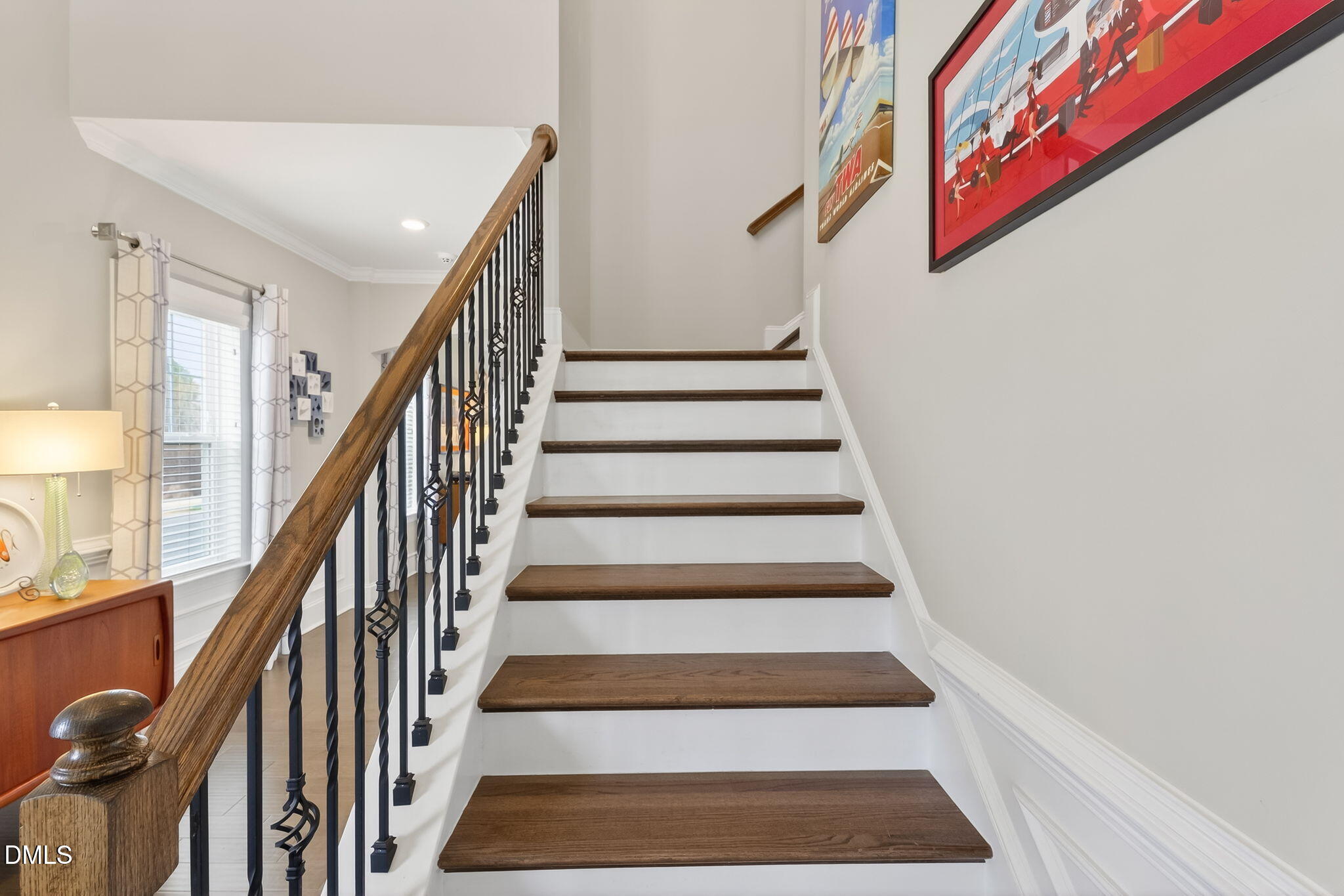 524 Dungannon Loop Clayton, NC 27520 - Photo 27 of 80 a view of staircase with wooden floor and white walls