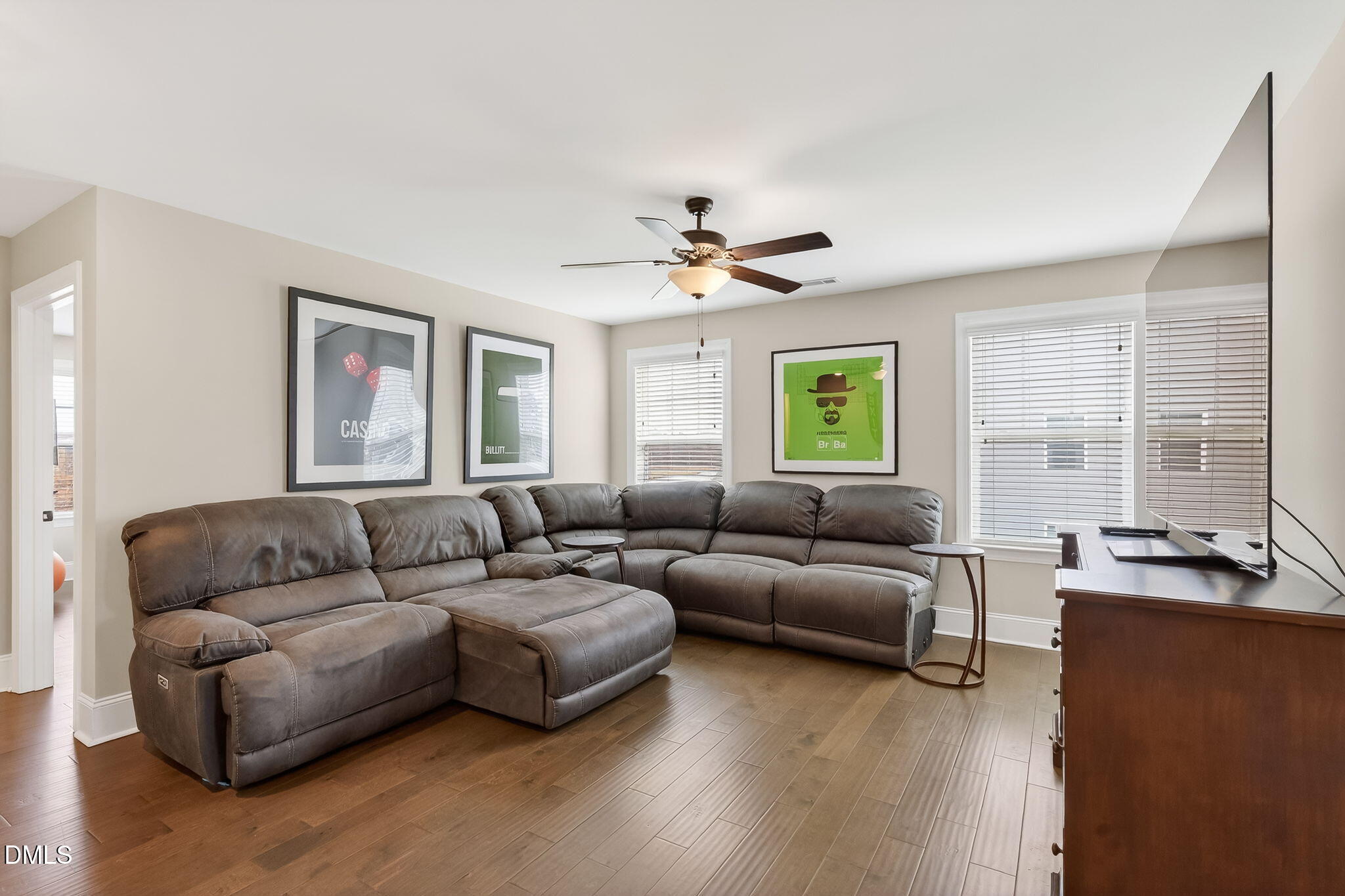 524 Dungannon Loop Clayton, NC 27520 - Photo 30 of 80 a living room with furniture and a large window
