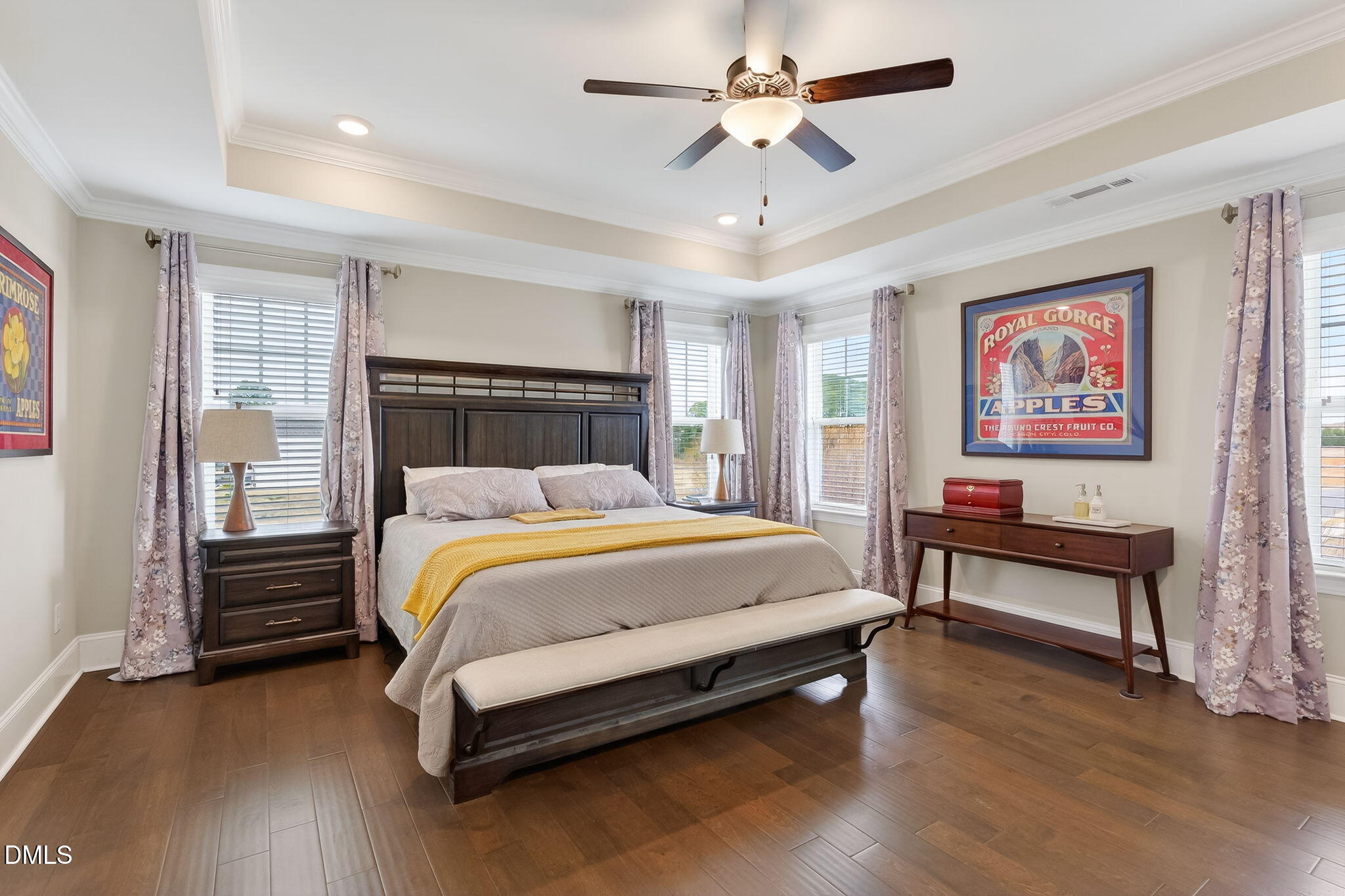 524 Dungannon Loop Clayton, NC 27520 - Photo 33 of 80 a spacious bedroom with a bed and a chandelier