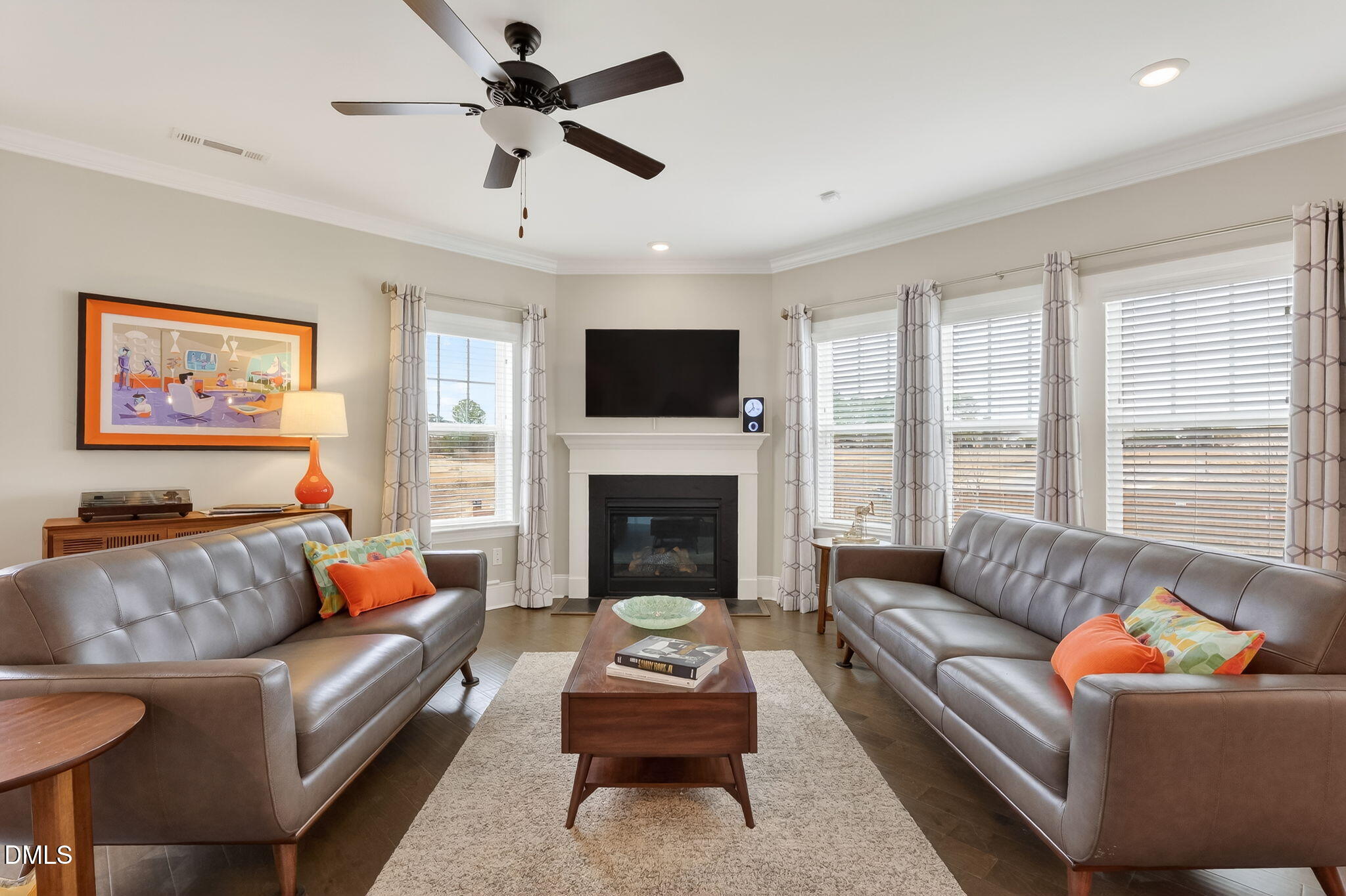 524 Dungannon Loop Clayton, NC 27520 - Photo 7 of 80 a living room with furniture fireplace and window