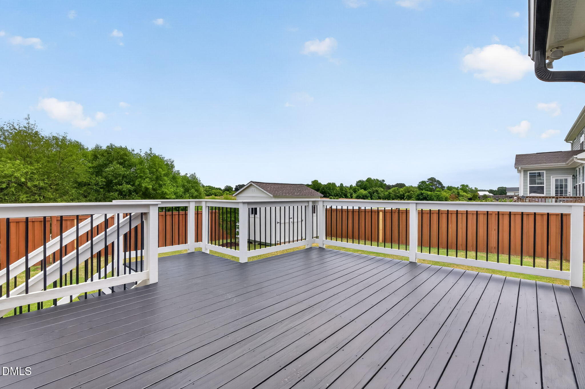 524 Dungannon Loop Clayton, NC 27520 - Photo 73 of 80 a balcony with wooden floor and city view