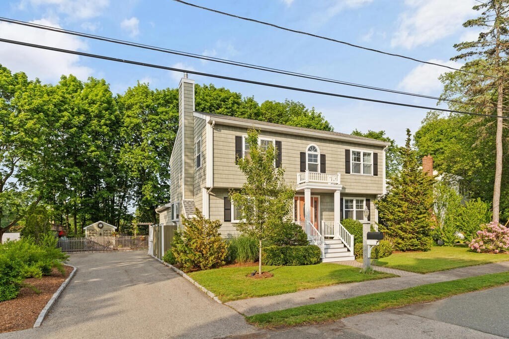 15 Millbrook Road Beverly, MA 01915 - Photo 1 of 32 a front view of a house with a yard