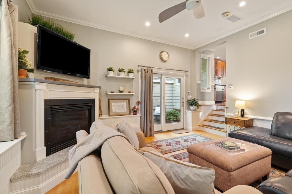 15 Millbrook Road Beverly, MA 01915 - Photo 12 of 32 a living room with furniture fireplace and flat screen tv