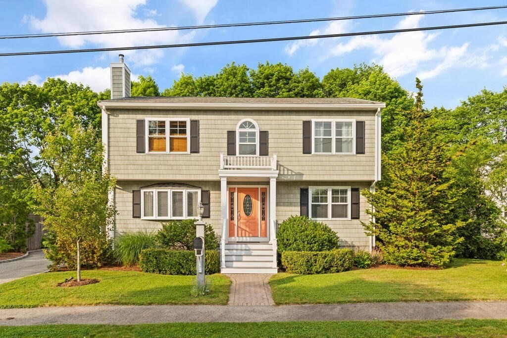 15 Millbrook Road Beverly, MA 01915 - Photo 2 of 32 a front view of a house with a yard