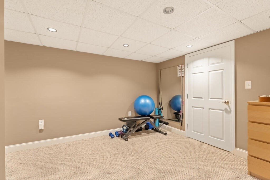 15 Millbrook Road Beverly, MA 01915 - Photo 24 of 32 a view of a room with gym equipment
