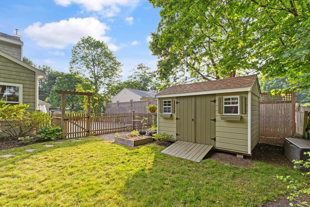 15 Millbrook Road Beverly, MA 01915 - Photo 28 of 32 a view of a house with a backyard and a tree