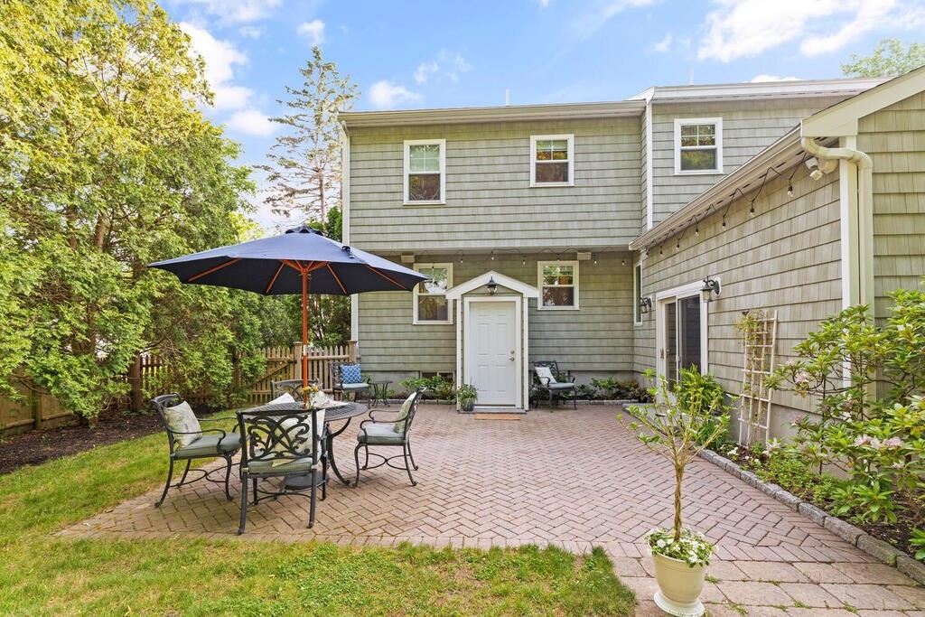 15 Millbrook Road Beverly, MA 01915 - Photo 30 of 32 a view of a house with backyard sitting area and garden