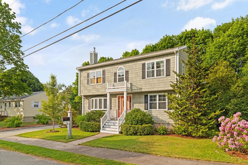 15 Millbrook Road Beverly, MA 01915 - Photo 3 of 32 a front view of a house with a yard