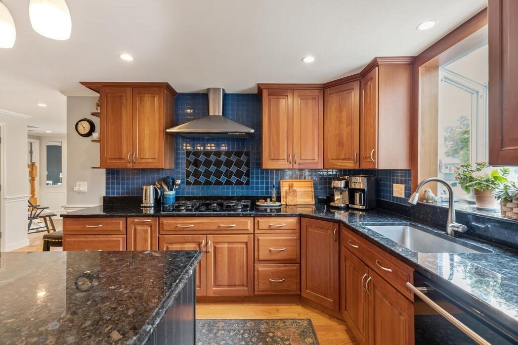 15 Millbrook Road Beverly, MA 01915 - Photo 10 of 32 a kitchen with stainless steel appliances granite countertop a sink stove and cabinets