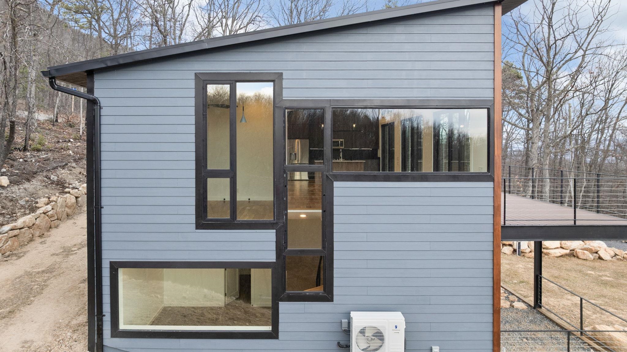 132 Holly Hl Road Luray, VA 22835 - Photo 60 of 69 a view of a brick house with a large windows