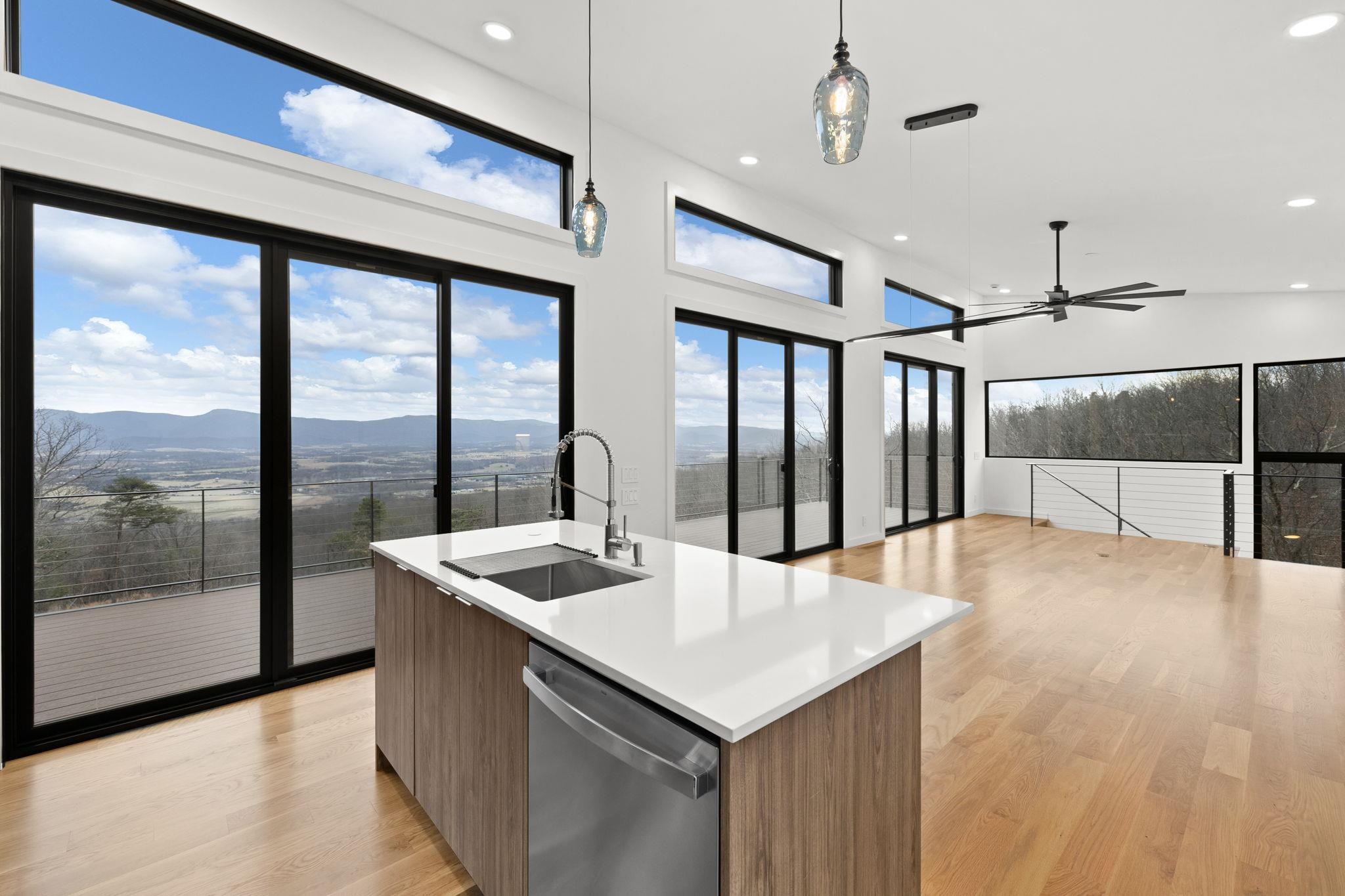 132 Holly Hl Road Luray, VA 22835 - Photo 6 of 69 a kitchen with stainless steel appliances kitchen island a large window