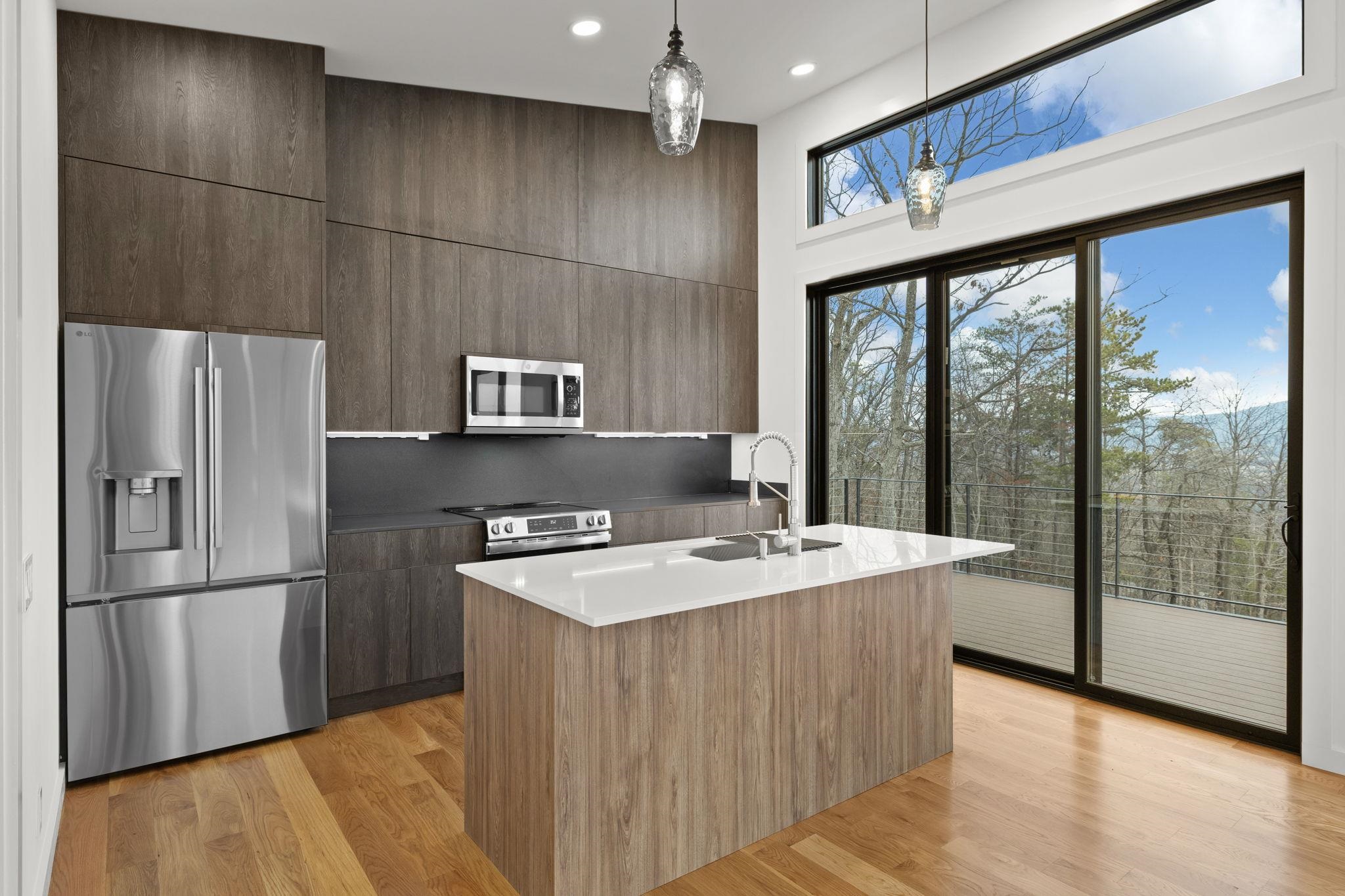 132 Holly Hl Road Luray, VA 22835 - Photo 8 of 69 a kitchen with stainless steel appliances granite countertop a refrigerator a sink and a stove