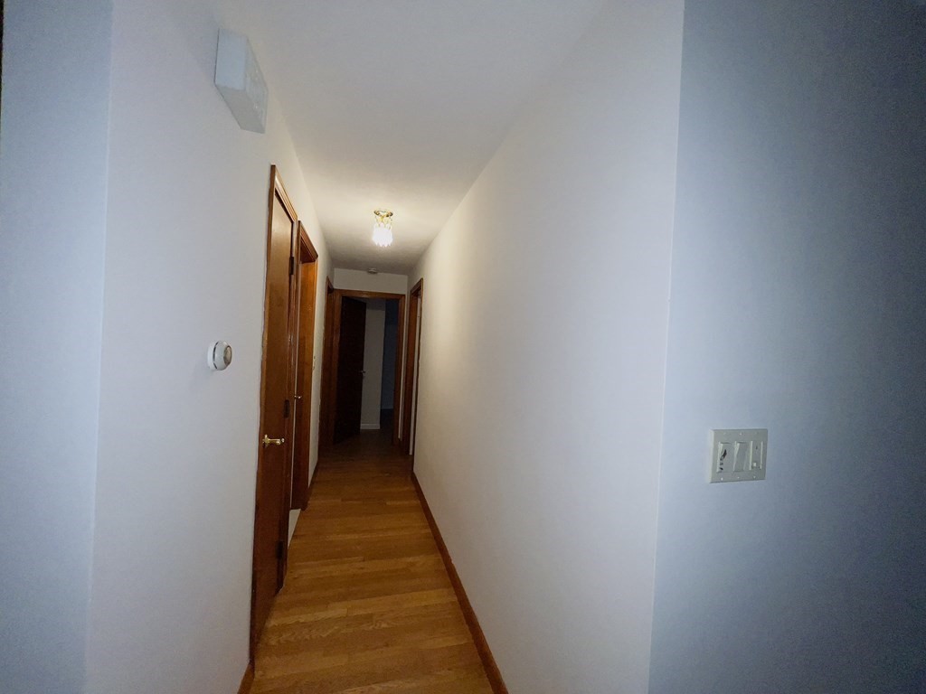 40 Michael Drive Brockton, MA 02301 - Photo 11 of 22 a view of a hallway with a white walls