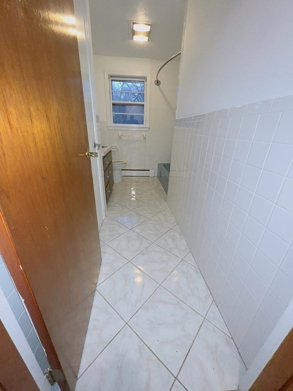 40 Michael Drive Brockton, MA 02301 - Photo 13 of 22 a view of an empty room with a window