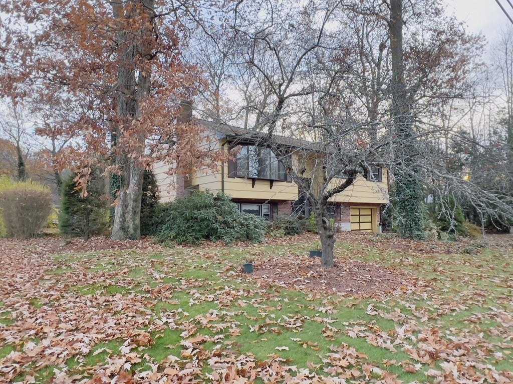 40 Michael Drive Brockton, MA 02301 - Photo 4 of 22 a front view of a house with a yard