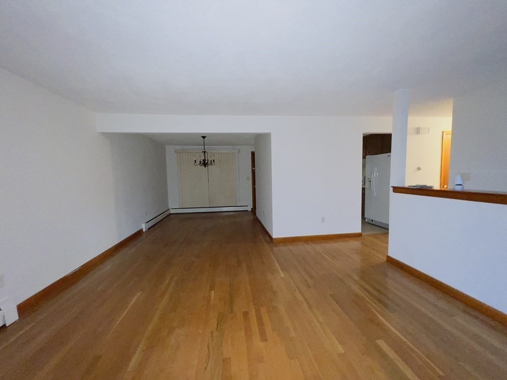 40 Michael Drive Brockton, MA 02301 - Photo 9 of 22 a view of empty room with wooden floor