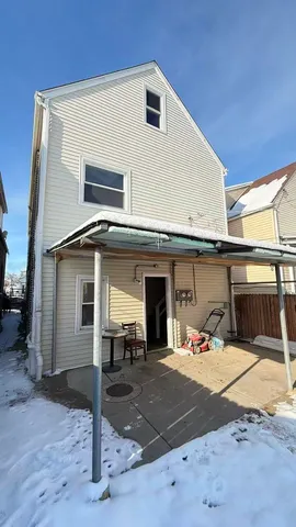 a view of a house with a patio