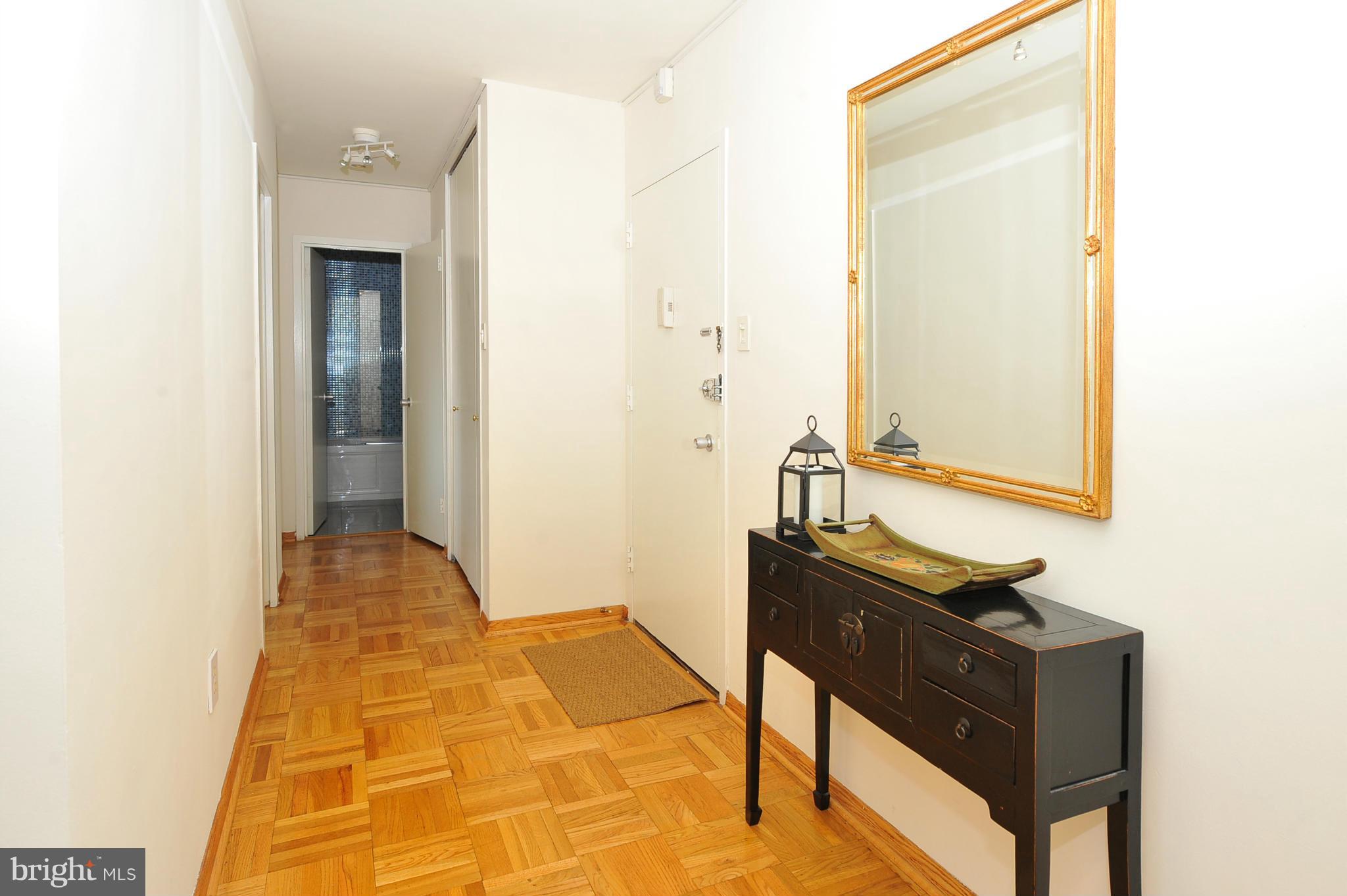 4000 Tunlaw Road Northwest, Unit 1026 Washington, DC 20007 - Photo 14 of 15 a view of a hallway with workspace