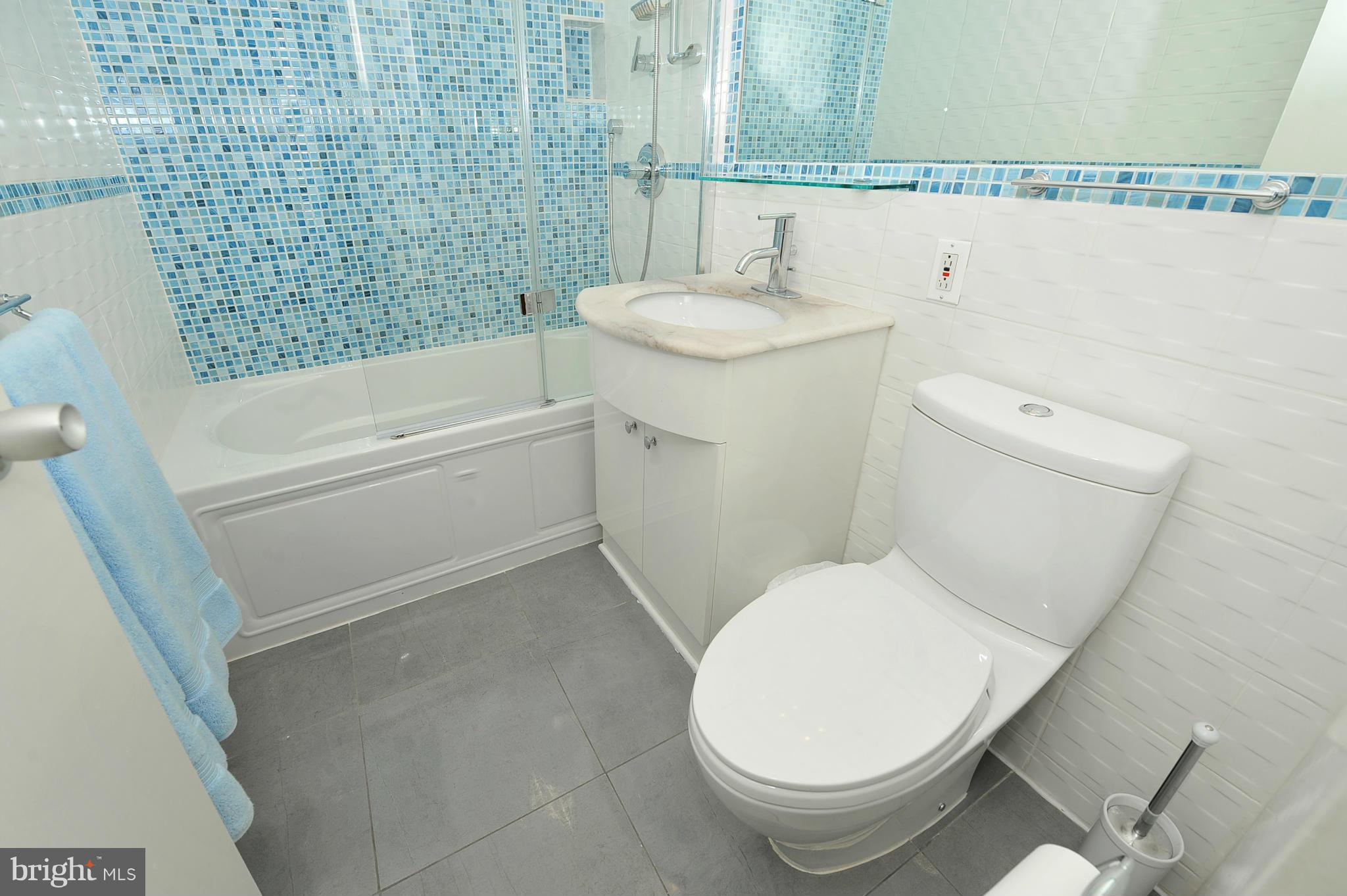 4000 Tunlaw Road Northwest, Unit 1026 Washington, DC 20007 - Photo 10 of 15 a bathroom with a toilet and a sink