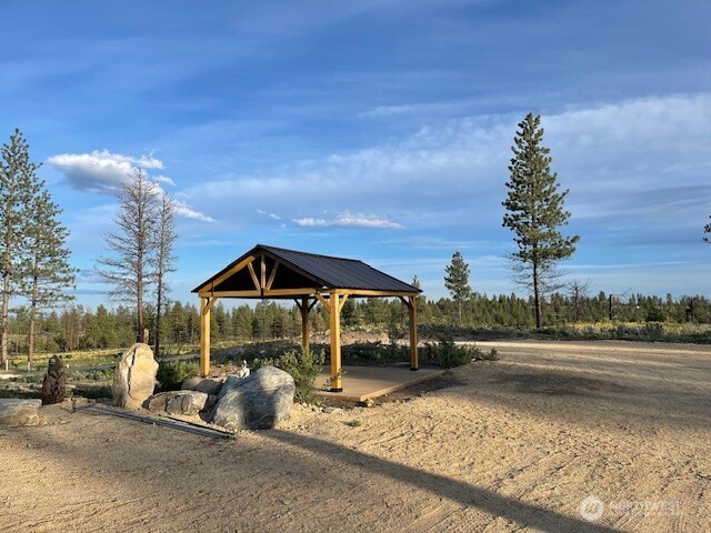 -nna Harmony Heights Road Brewster, WA 98812 - Photo 23 of 39 a view of a house with a yard and sitting area