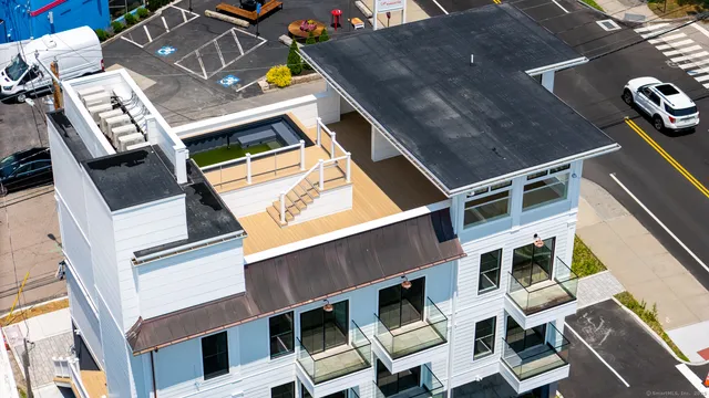 a view of an chairs in the balcony