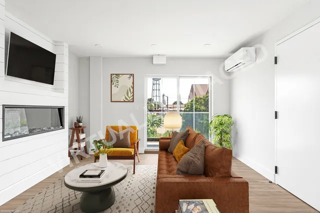 a living room with furniture a flat screen tv and a window