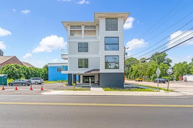 a building exterior with stairs and windows