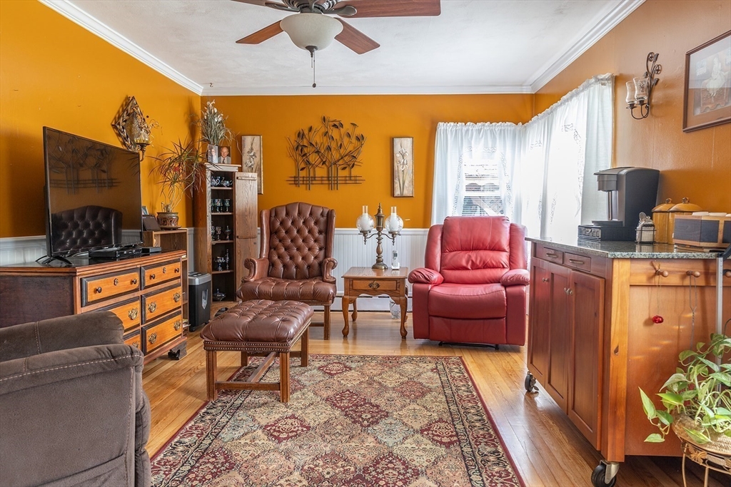 224 Palmer Road Monson, MA 01057 - Photo 12 of 40 a living room with furniture and a flat screen tv