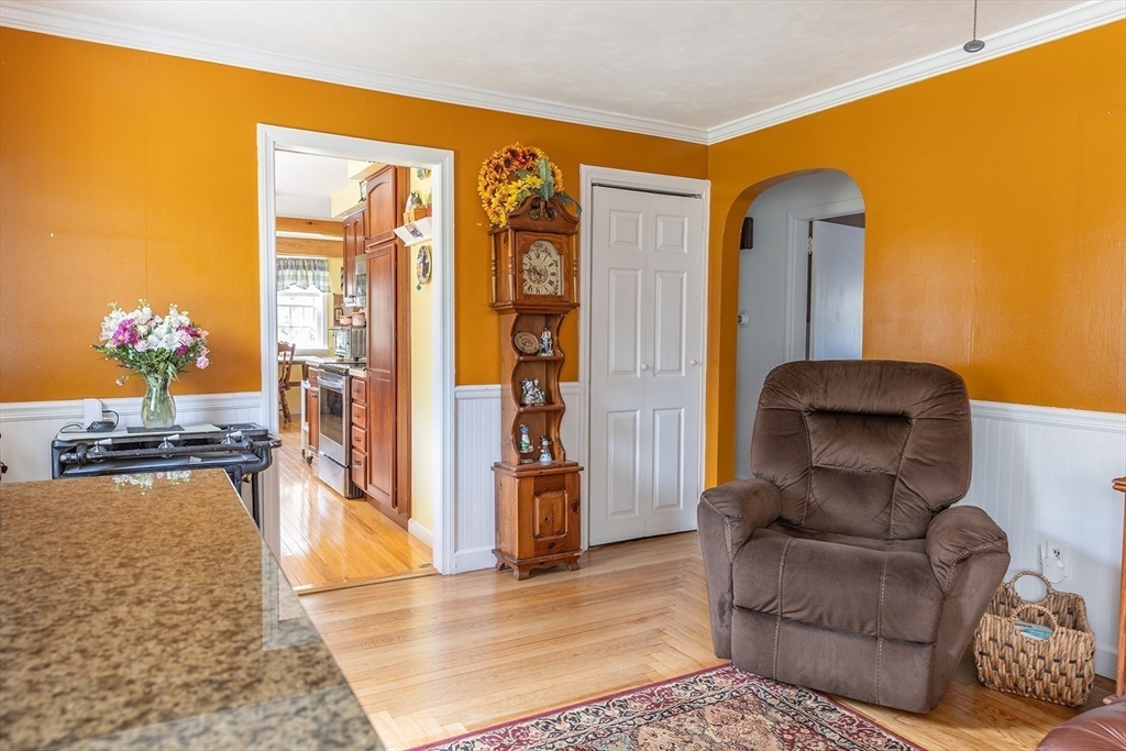 224 Palmer Road Monson, MA 01057 - Photo 14 of 40 a living room with furniture rug and a dining table