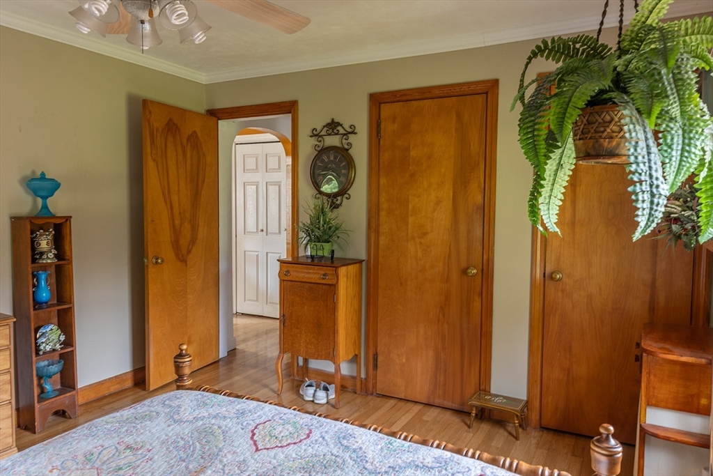 224 Palmer Road Monson, MA 01057 - Photo 21 of 40 a view of a hallway with wooden floor and a closet