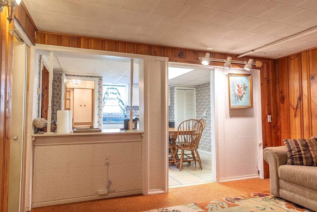 224 Palmer Road Monson, MA 01057 - Photo 29 of 40 a living room with furniture and a large window