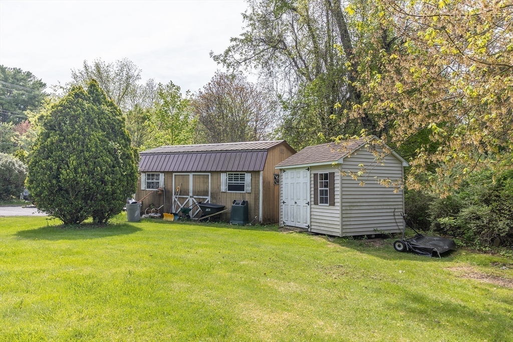 224 Palmer Road Monson, MA 01057 - Photo 33 of 40 a view of a house with a yard and sitting area