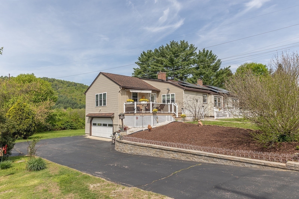 224 Palmer Road Monson, MA 01057 - Photo 35 of 40 a view of a house with a outdoor space