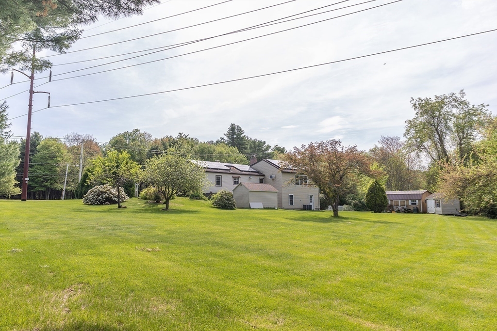 224 Palmer Road Monson, MA 01057 - Photo 39 of 40 a view of a big yard with large trees