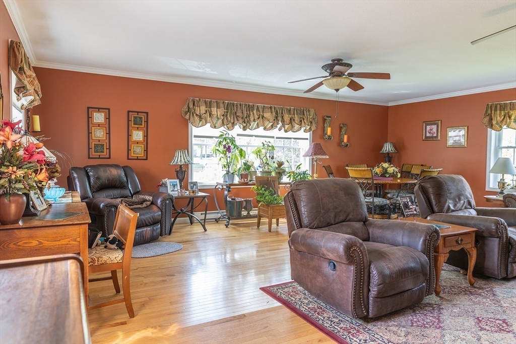 224 Palmer Road Monson, MA 01057 - Photo 7 of 40 a living room with furniture and a large window