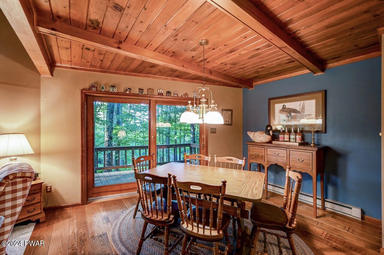110 Valley Run Road Greentown, PA 18426 - Photo 28 of 67 a view of a dining room with furniture window and wooden floor