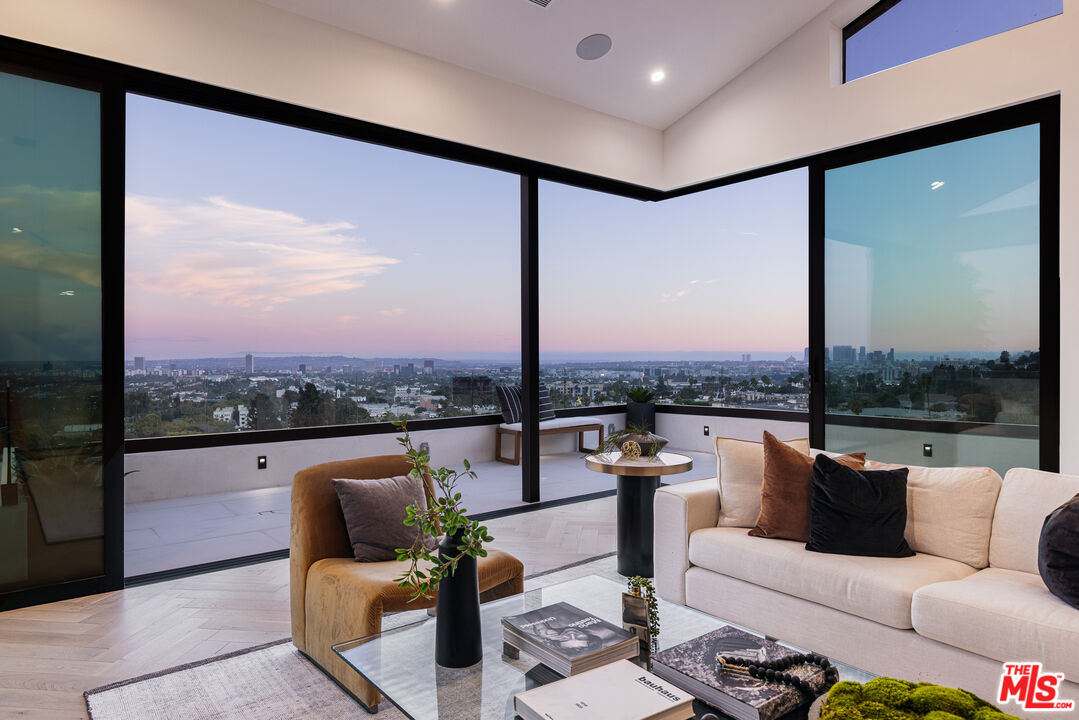 7866 Fareholm Drive Los Angeles, CA 90046 - Photo 23 of 27 a roof deck with couch