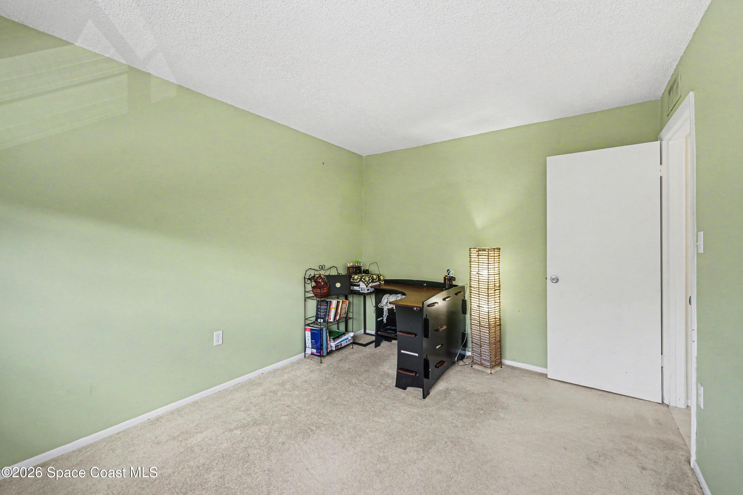 3135 Shady Dell Lane Melbourne, FL 32935 - Photo 9 of 18 009_file_1590