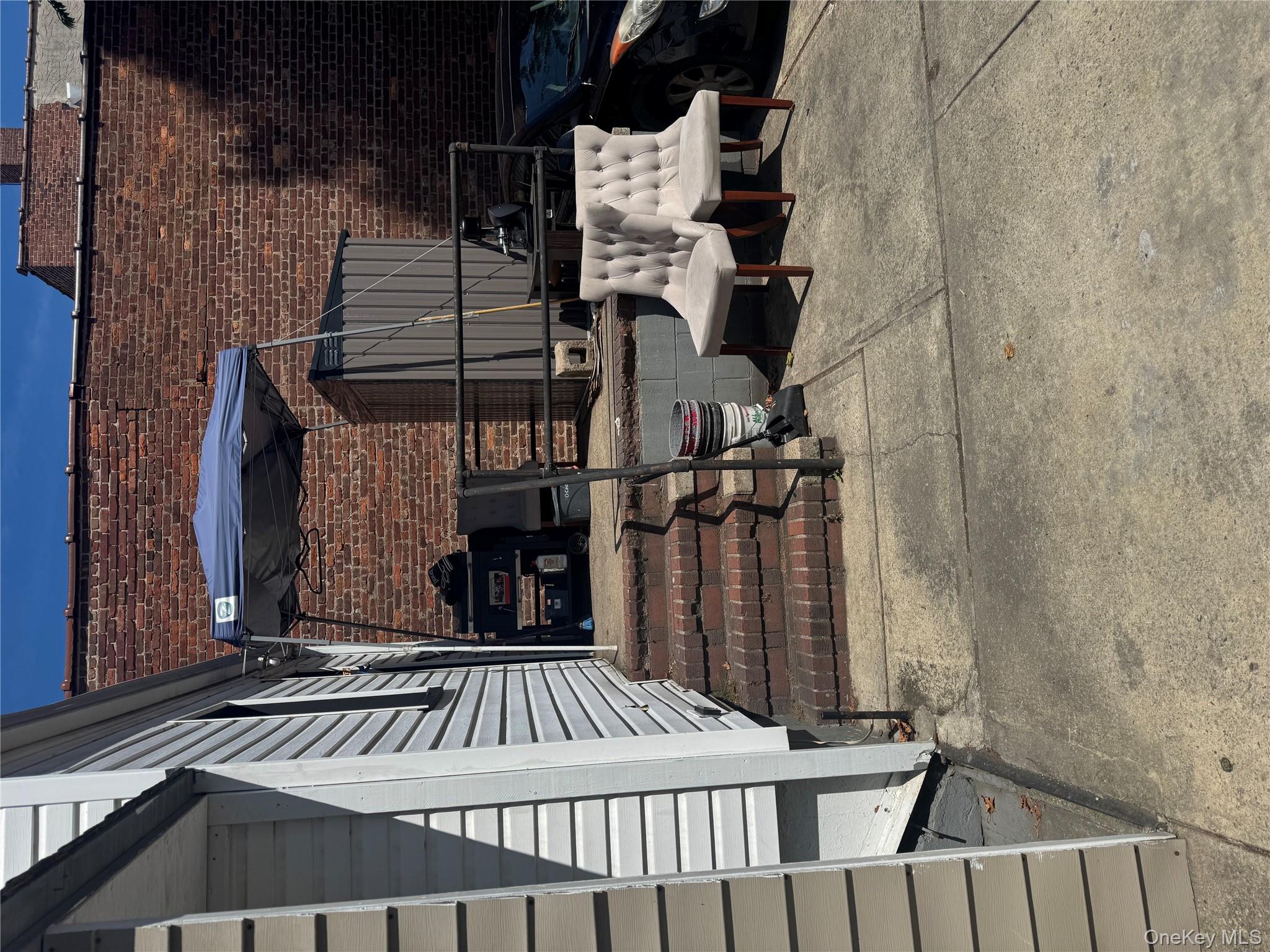 94-13 116th Street Queens, NY 11419 - Photo 6 of 34 View of patio / terrace