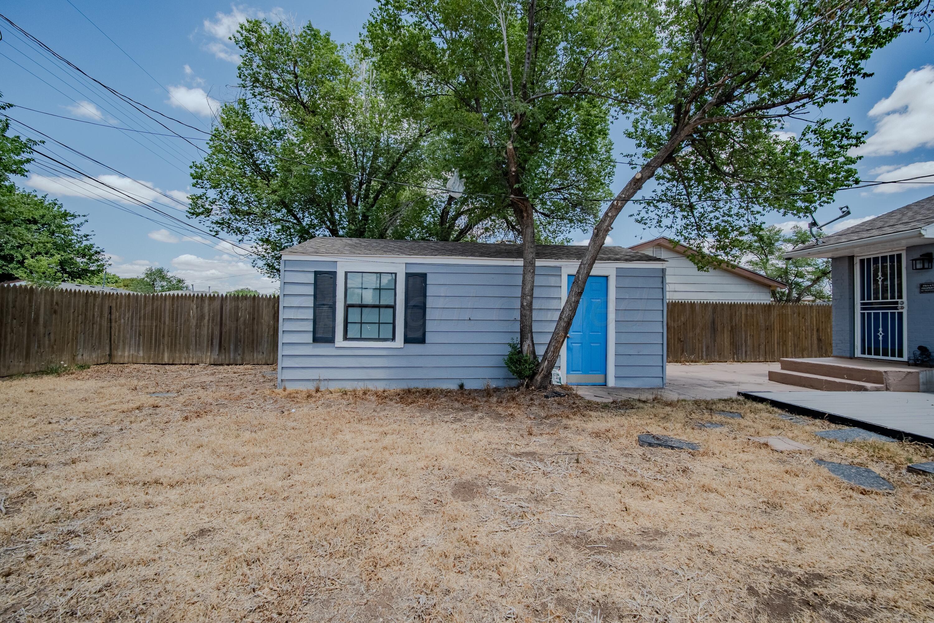 4014 Gables Street Amarillo, TX 79110 - Photo 13 of 14 a view of a house with a yard
