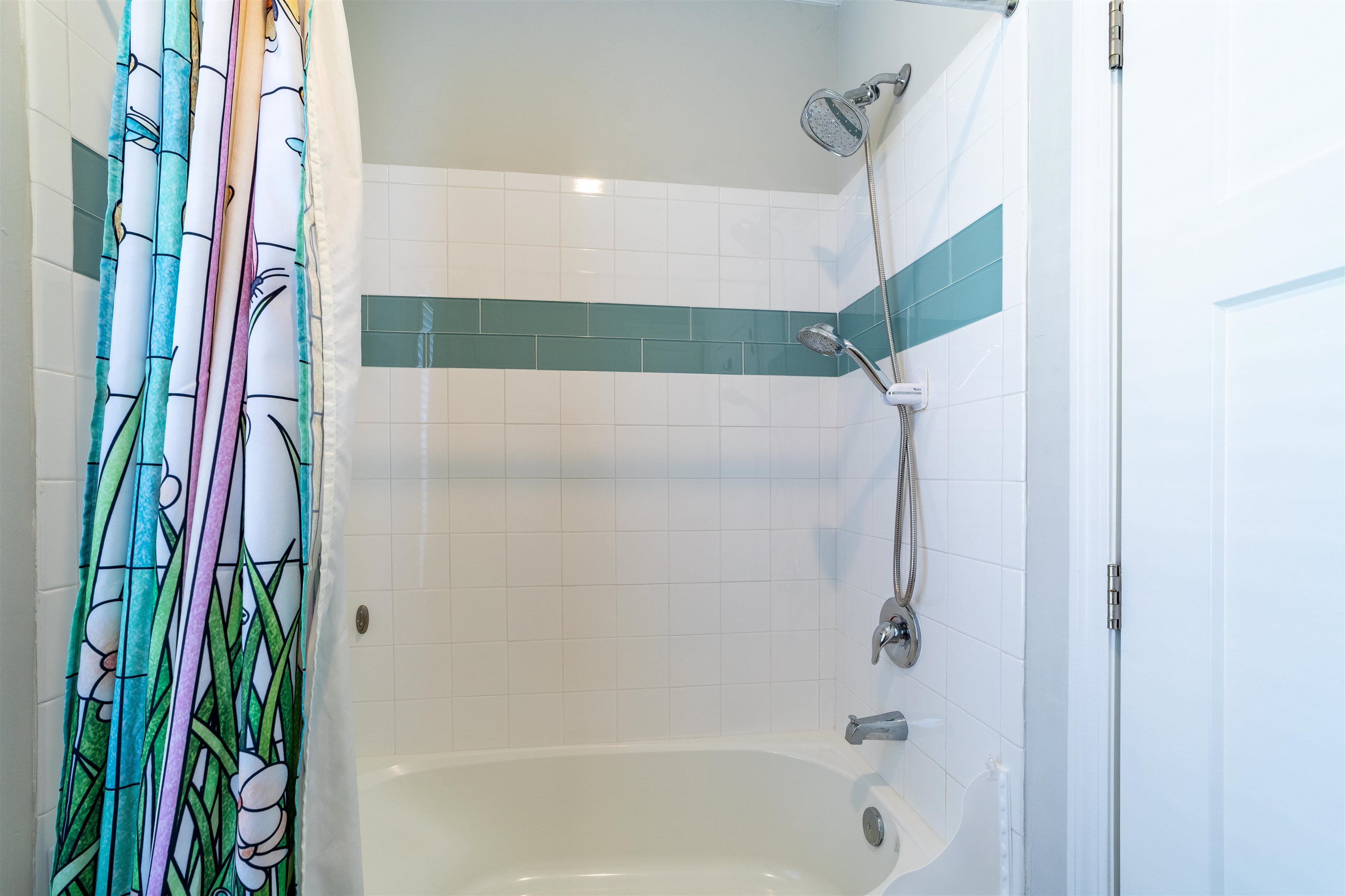 5730 Datil Pepper Road St. Augustine, FL 32086 - Photo 32 of 35 a bathroom with a shower and a shower curtain